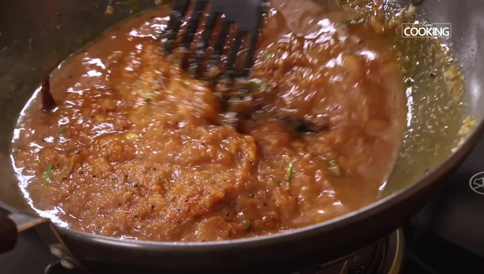 Add lemon juice and tamarind extract. Mix well, cover the pan slightly and simmer for 15 minutes.