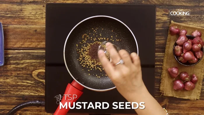 Roast fenugreek, mustard, coriander, and cumin seeds in a pan until fragrant. Grind into a fine powder once cooled.