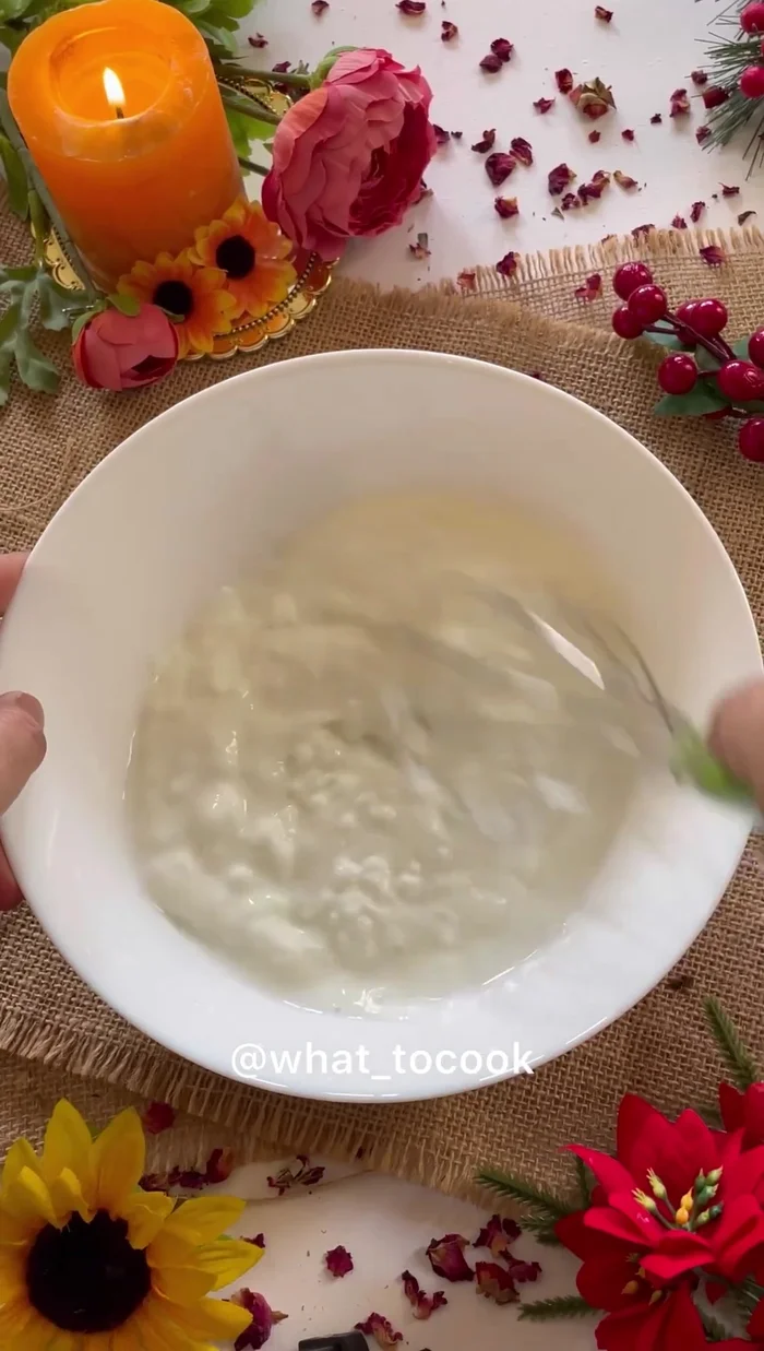 Whisk the yogurt, adding a little water at a time to achieve the desired consistency. Avoid adding too much water at once to prevent it from becoming too thin.