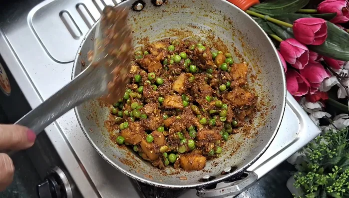Add salt to taste and a little water to prevent burning. Stir and fry.