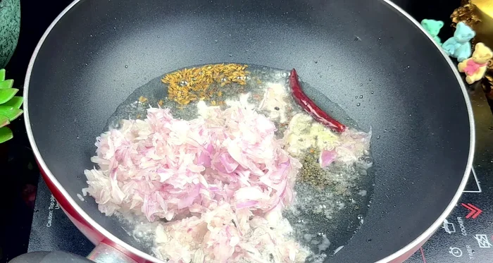 Add thinly sliced onions and sauté over medium heat for about 10 minutes until golden brown.