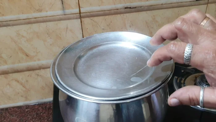 Drain the water from leftover cooked rice. [130.16]