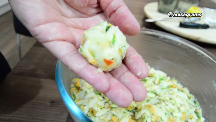 Roll the mixture into small balls. Refrigerate for 30 minutes to firm up. (145.16)