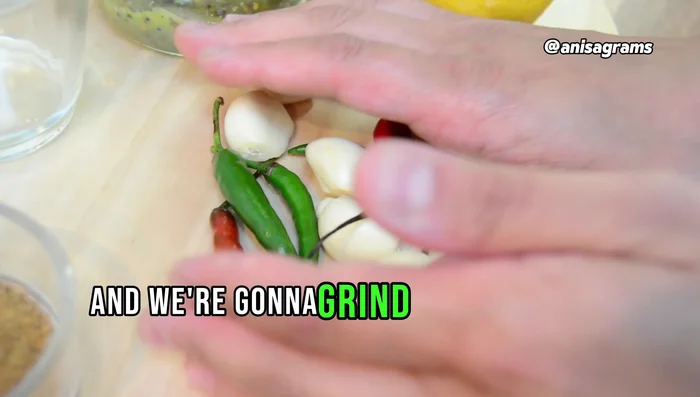 Grind chilies and garlic into a paste using a blender. (58.719)
