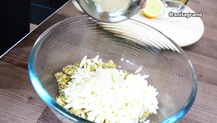 Add cooked pasta, mashed potatoes, cheese, salt, and lemon juice to the chicken mixture. Mix well. (90.84)