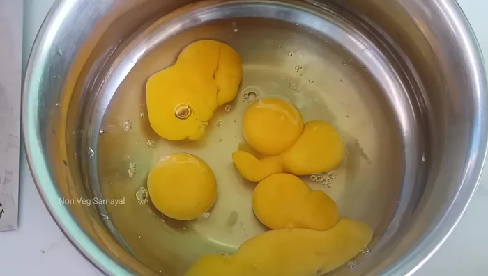 In a separate bowl, whisk the eggs with Genie, sunflower oil, and a pinch of salt.