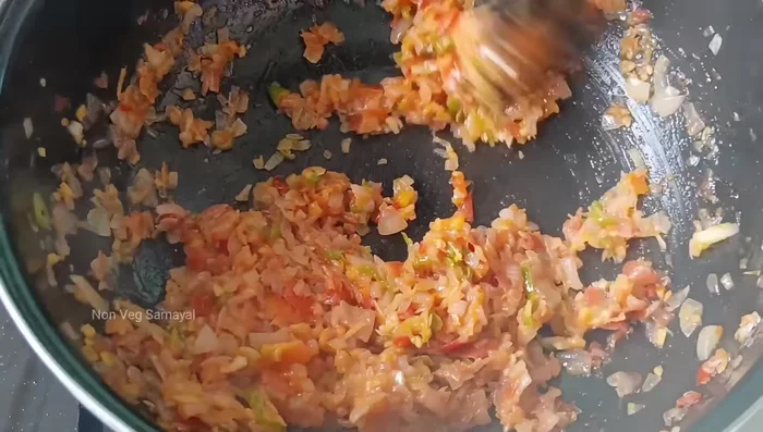 Set aside the cooked onion and tomato mixture. Add tamarind paste in the pan.