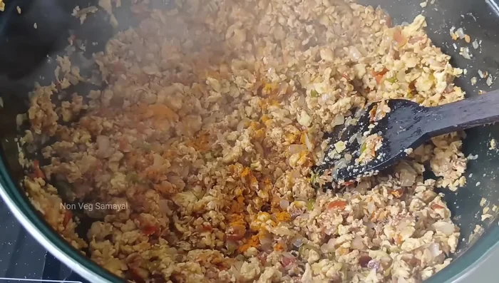 Add turmeric powder and mix. Continue frying for about seven minutes until well cooked.