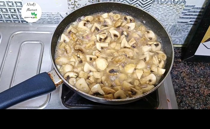 Cook until the water reduces. [125.2]