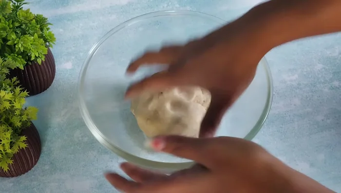 Knead the dough again to make it smooth.