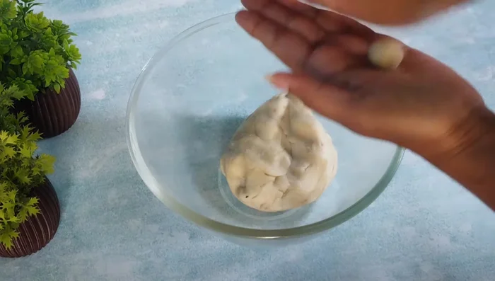Roll the dough into small balls, smaller than a lemon.