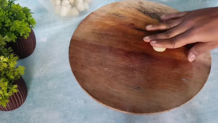 Using a fork, poke small holes in each circle to prevent puffing during frying.