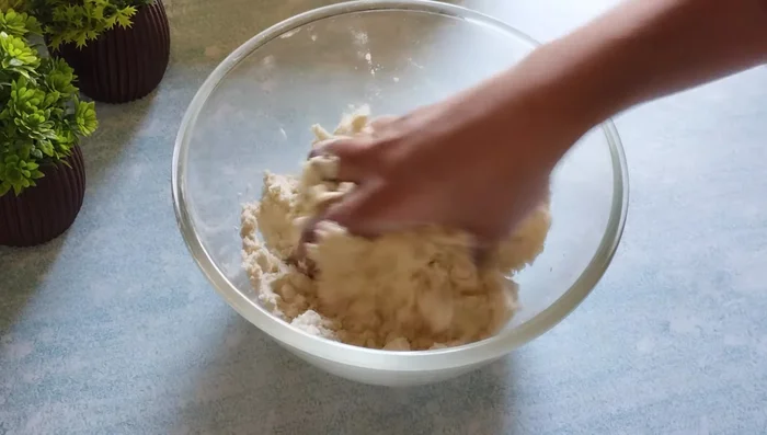 Gradually add water to make a stiff dough. Do not make it soft.