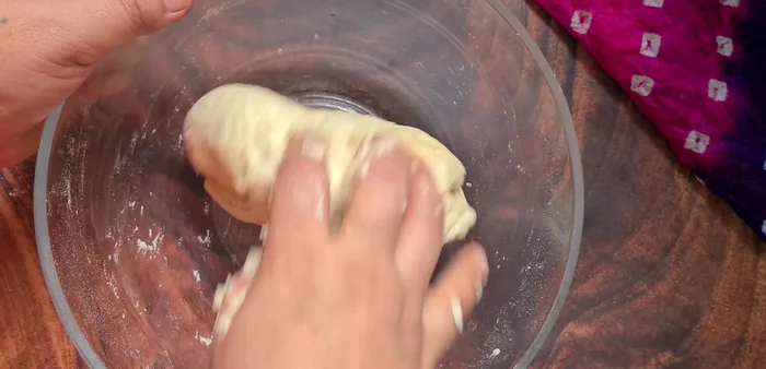 Add 1 teaspoon of oil to the dough and knead until smooth. Let it rest for 15-20 minutes.