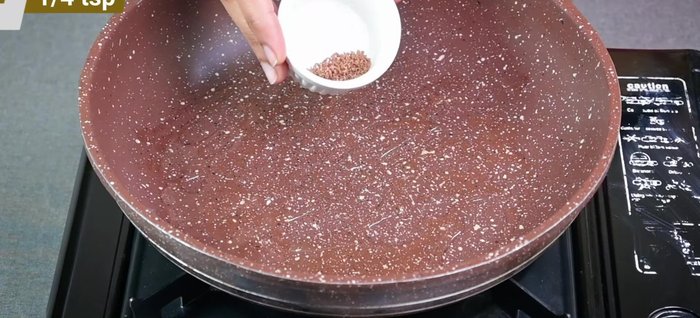 Heat oil in a pan. Add celery and cumin seeds, crackle them. Add chopped onions and sauté until slightly transparent (not browned).