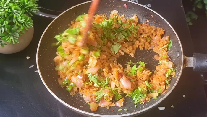 Stir in finely chopped coriander leaves and set aside to cool.