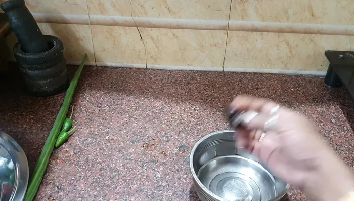 Soak the tamarind in water and extract the pulp.