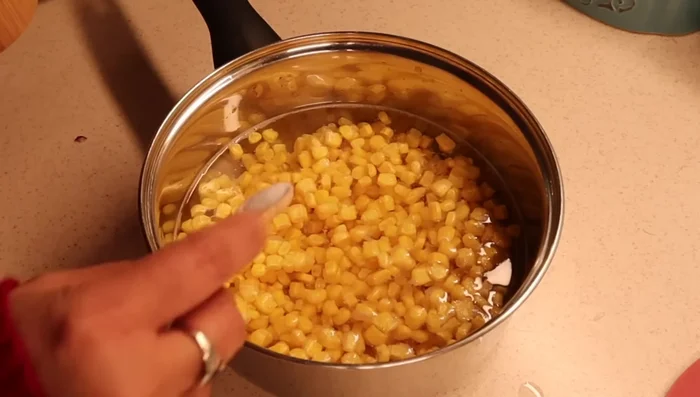 Boil sweet corn in water for 10 minutes until soft.