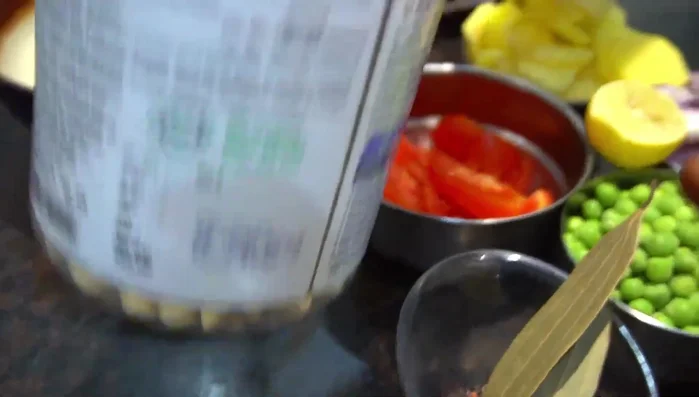 Fry cumin seeds, cloves, bay leaf, cardamom, and cinnamon until fragrant.