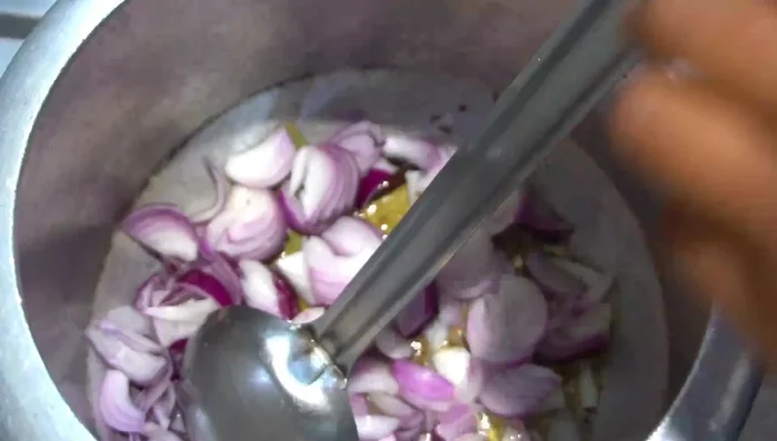 Add onions and cook until light pink.