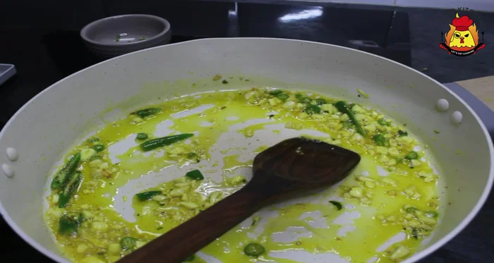 Add the soaked moong dal. Cook on medium flame until lightly fried and aromatic.