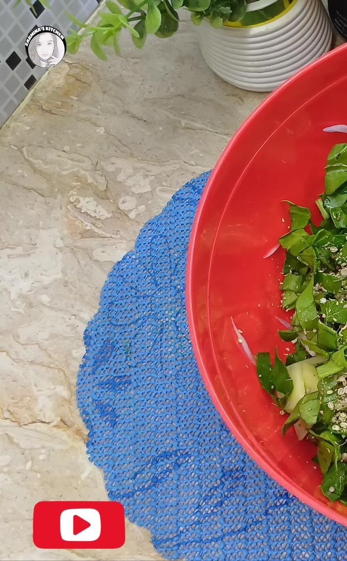 In a large bowl, combine the chopped vegetables, coarsely ground coriander, whole coriander, cumin seeds (lightly crushed), celery, crushed chilies, turmeric powder, coriander powder, red chili powder, salt, and chaat masala.