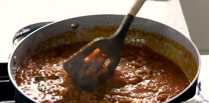 Reduce heat to low, taste, and adjust seasoning (salt, sugar, spice).