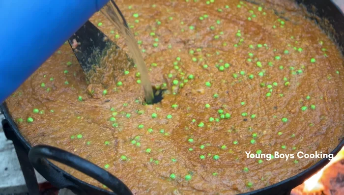 Add masala, salt, water, and curd.