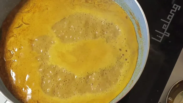 Reduce heat to medium-low. Gently slide in the eggs one at a time, keeping some distance between each, and simmer for 3-4 minutes without stirring.