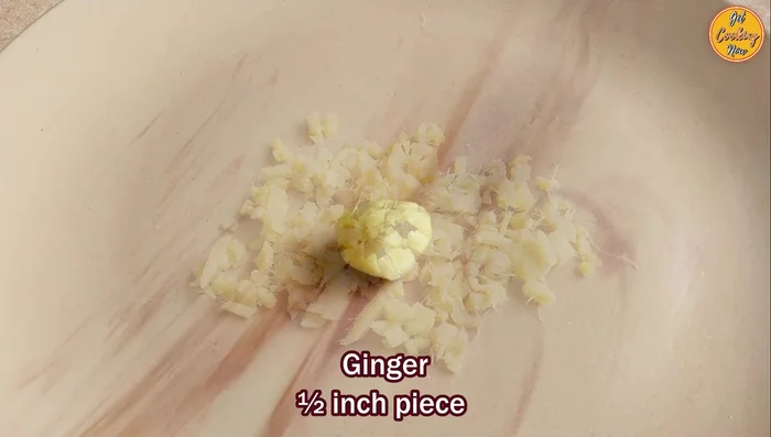 Prepare ingredients: Finely chop onions, ginger, garlic, and green chilies. Prepare curry leaves and coriander leaves. Peel and cube the boiled potatoes.