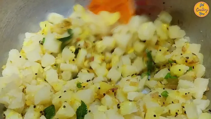 Add potatoes and water: Add the cubed potatoes to the pan, stir well. Add 1 cup of water, and mash some potatoes to thicken the gravy. Cook for about 5 minutes.