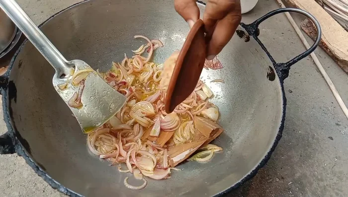 Add ginger-garlic paste and fry for a minute.
