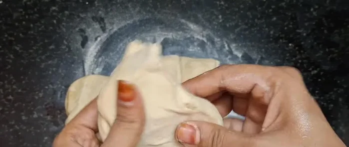 Roll out each portion into a thin circle using a rolling pin.