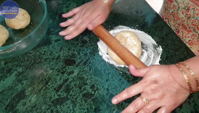 For variation 4, roll a thin roti, place stuffing in the center, and spread evenly using a rolling pin. Remove center, and cut into 16 portions. Roll each portion, sealing with flour paste. Fry until golden and crispy.