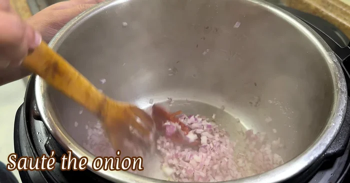 Add ginger-garlic paste and chopped tomatoes. Sauté for a minute until tomatoes are mushy.