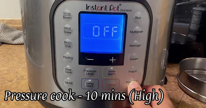 Close the lid, select pressure cook for 10 minutes on high pressure, and keep warm for 14-15 minutes. Allow pressure to release naturally.