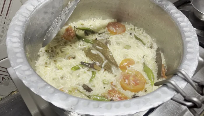 Cook the rice: Cover and cook for 15-20 minutes, or until the rice is cooked and the water is absorbed.
