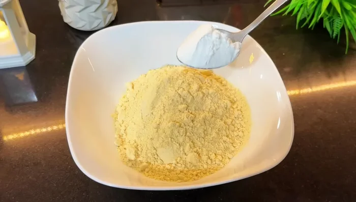 Prepare the batter: Combine gram flour, corn flour, salt, red chili powder, turmeric powder, roasted crushed coriander, and white cumin seeds.