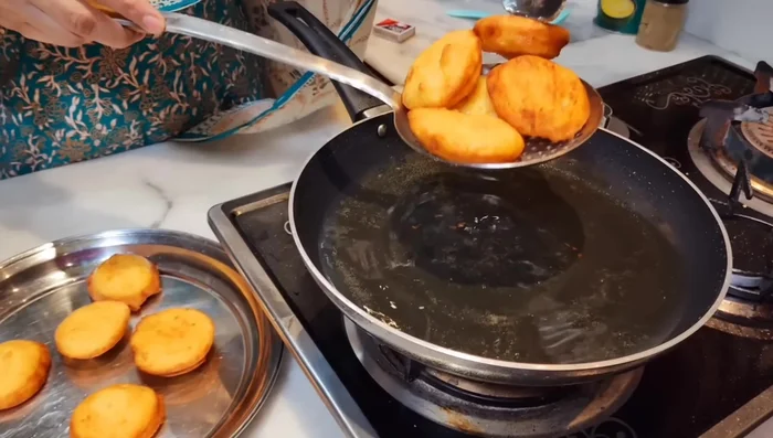 Fry until golden brown on both sides. (Remove and drain on paper towels)
