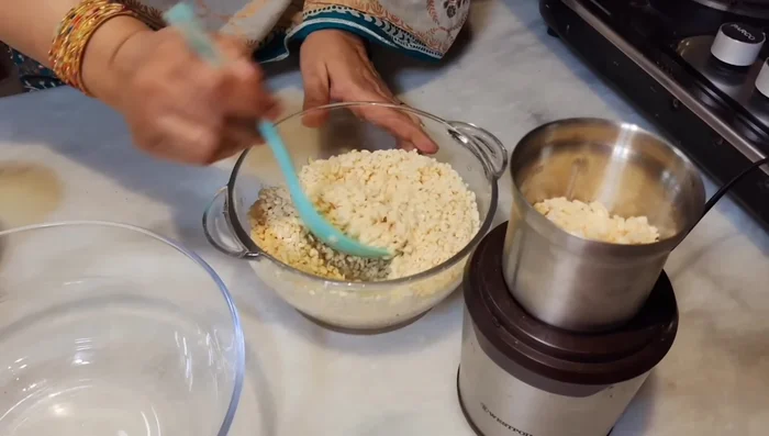 Grind soaked lentils into a smooth paste with a little water. (Use a blender or grinding stone.)