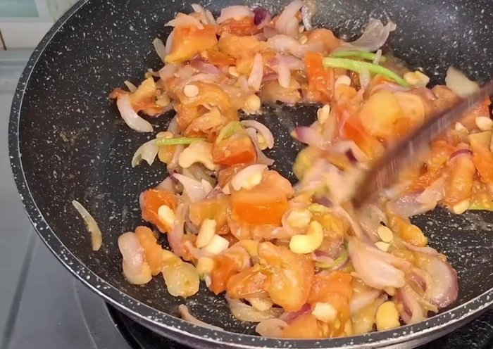 Add 0.5 cup water, cover, and cook until spices are well done (about 5 mins).