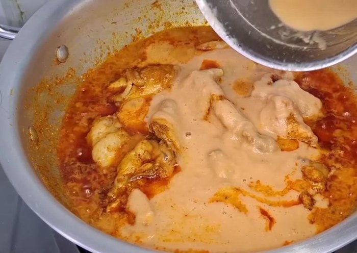 Add the blended tomato mixture, some water, and cook on high flame until all spices mix well (2-3 mins).