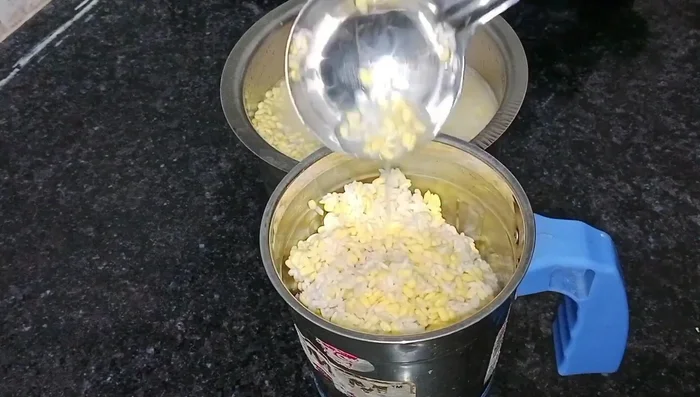Grind the soaked mixture into a fine paste. Add 2-3 spoons of semolina if the batter is too wet.
