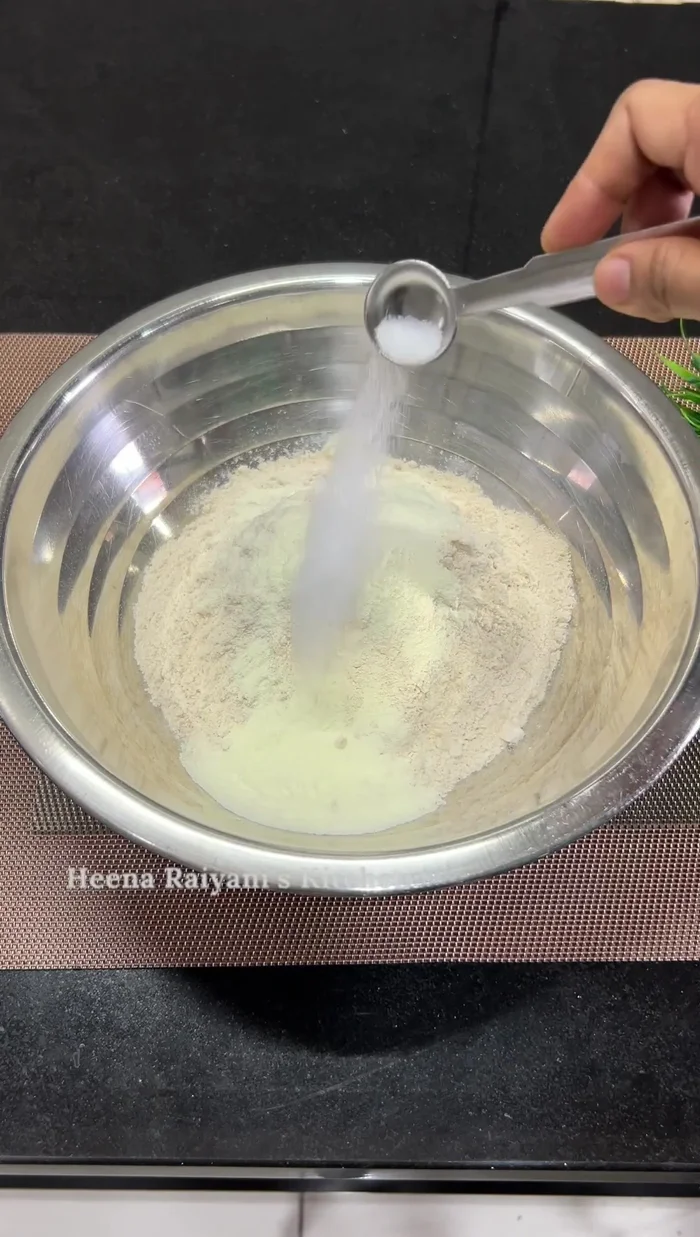 In a mixing bowl, combine wheat flour, milk powder, salt, and oil. (118.88)