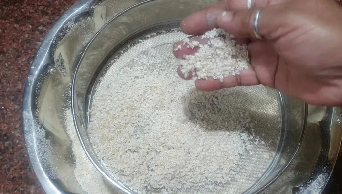 Grind the dried corn using a mixer or mortar and pestle until it forms a paste. Remove any husk that separates during grinding.