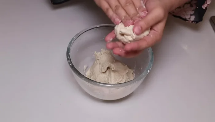 Make the parathas: Roll out small balls of dough into thin circles. Cook them on a hot pan with a little oil on both sides until golden brown.