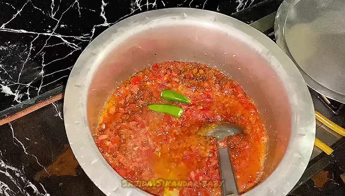 Add green chilies.