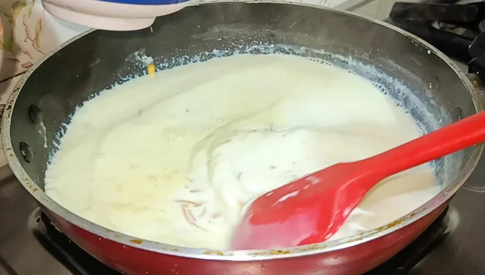 Reduce heat, gradually add the custard mixture to the boiling milk, stirring constantly.