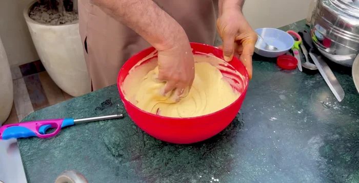 Add the marinated chicken to the batter and mix well.