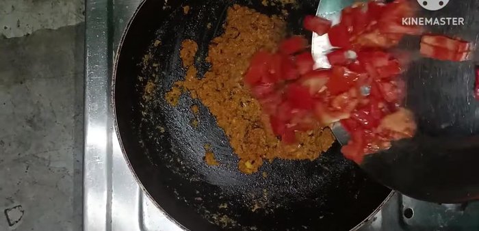 Add tomatoes and cook until they soften.